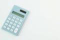 Blue calculator white background image close up. Royalty Free Stock Photo