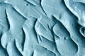 Blue cambrian cosmetic clay facial mask, cream texture close up, selective focus. Abstract background with brush strokes. Royalty Free Stock Photo