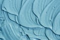 Blue cambrian cosmetic clay facial mask, cream texture close up, selective focus. Abstract background with brush strokes. Royalty Free Stock Photo