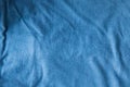 Blue canvas fabric cotton textile background with folds waves Royalty Free Stock Photo