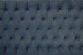 Blue capitone checkered soft fabric textile decorative background with buttons