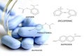 Blue caplets and some analgesic chemical structure. Royalty Free Stock Photo