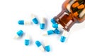 Blue capsules with bottle, healthcare and medicine Royalty Free Stock Photo