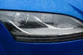 Blue car detail, car headlight, vehicle lighting source