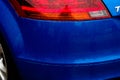 Blue car detail, car headlight, vehicle lighting source