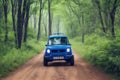 Blue Car on Dirt Road Between Green Leaf Trees generated by Ai