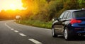 Blue car on the expressway Royalty Free Stock Photo