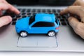 Blue Car On Laptop Keypad Royalty Free Stock Photo