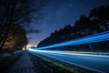 Blue car lights at night with long exposure Royalty Free Stock Photo