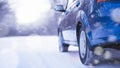 Blue Car Moving Fast on the Winter Snowy Road. Safe Driving Concept. Royalty Free Stock Photo