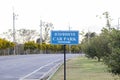 Blue car park direction sign in a tourist attraction thailand with thai word mean `car park`. Royalty Free Stock Photo