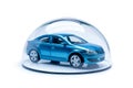 Blue car protected under glass dome on white background. Car insurance Royalty Free Stock Photo