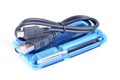 Blue card reader and black cable Royalty Free Stock Photo