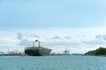 Blue cargo ship on water, huge empty container ship