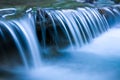 Blue cascade of mountain river