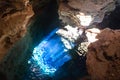 Blue cave with sunray lights