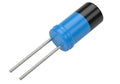 Blue ceramic capacitor with two metal terminals for electronic circuits Royalty Free Stock Photo