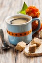 Blue ceramic cup of black hot coffee with brown sugar Royalty Free Stock Photo