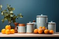 Blue ceramic kitchenware with tangerines and lemons on a background of a blue wall Royalty Free Stock Photo