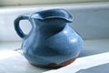 Blue ceramic pitcher