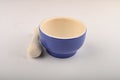 Blue ceramic spice mortar with pestle on white background. Close up Royalty Free Stock Photo