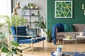 Blue chair in elegant modern living room interior Royalty Free Stock Photo