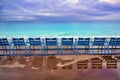 Blue chairs along the Promenade des Anglais on the Mediterranean Sea at Nice, France Royalty Free Stock Photo