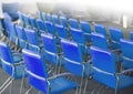 blue chairs in ordinary empty waiting room. Selective focus Royalty Free Stock Photo