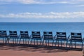 Blue chairs on Promenade Des Anglais, Nice, France Royalty Free Stock Photo