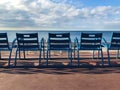 Blue chairs on Promenade Des Anglais, Nice, South of France Royalty Free Stock Photo