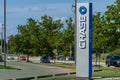 Blue Chase Bank Sign with drive thru, atm and flowers on green grass and blue sky Royalty Free Stock Photo