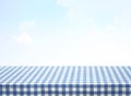 Blue checkered tablecloth empty advertisement space. Food promotion table.Product display