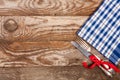 blue checkered tablecloth on the old wooden table with copy space for your text. Top view Royalty Free Stock Photo