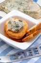 Blue cheese Cabrales spread on toasted bread. Royalty Free Stock Photo