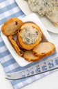 Blue cheese Cabrales spread on toasted bread. Royalty Free Stock Photo