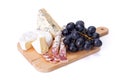 Blue cheese, camembert and dry sausage with grape