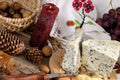 Blue cheese, fruits and objects isolated