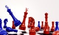 Blue chess against red chess with dollar and yuan renminbi sign logo Royalty Free Stock Photo