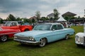 Blue Chevrolet Impala sedan in outdoor car show Royalty Free Stock Photo