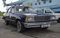 Blue Chevrolet Malibu 198 at exhibition of historics, vintage transport