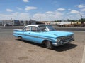 Blue Chevy Impala at Wigwam Motel