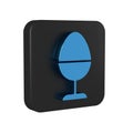 Blue Chicken egg on a stand icon isolated on transparent background. Black square button.