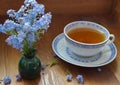 Blue china tea cup with forget me nots Royalty Free Stock Photo