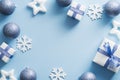 Blue Christmas background with decorations, baubles, snowflakes, gifts. Christmas holiday celebration, winter, New Year concept. Royalty Free Stock Photo