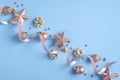 Blue Christmas background with pink decorations, stars, baubles, confetti. Christmas holiday celebration, winter, New Year concept Royalty Free Stock Photo