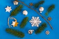 Blue christmas background, stars,needles,bulbs Royalty Free Stock Photo