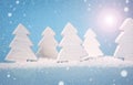 Blue Christmas background with white trees Royalty Free Stock Photo