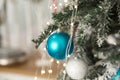 Blue Christmas ball hanging on the Christmas tree, greeting in the new year Royalty Free Stock Photo