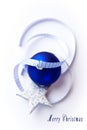 Blue christmas ball with ribbon and star Royalty Free Stock Photo