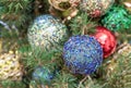 Blue Christmas ball with sparkles and bugles on the Christmas tree Royalty Free Stock Photo